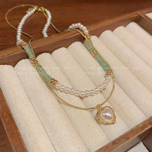 Double Heart Embrace Necklace