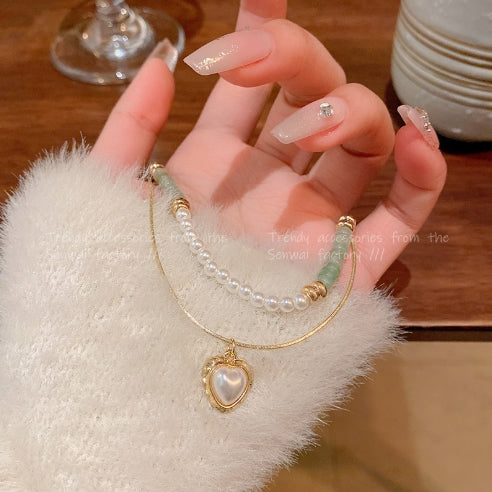 Double Heart Embrace Necklace